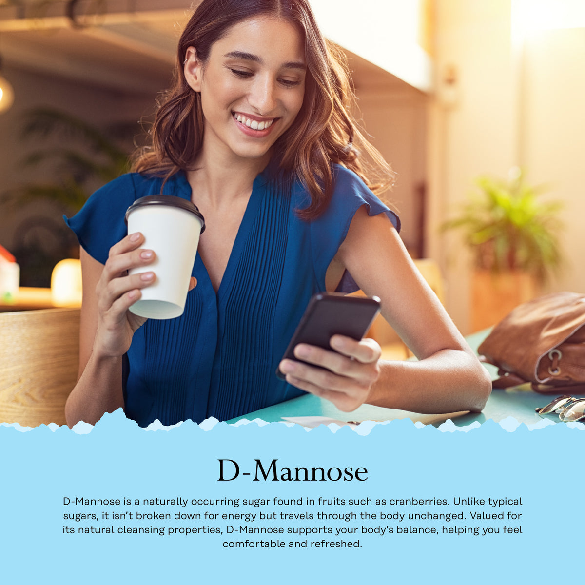 Woman in blue blouse smiles with coffee and phone at table; Solaray D-Mannose Cranberry infographic is below.