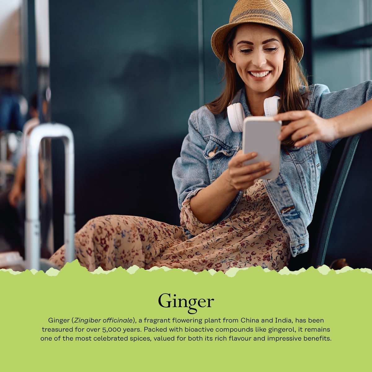Smiling woman in a hat at airport holds phone, with text on benefits of Solaray Ginger.