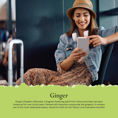 Smiling woman in a hat at airport holds phone, with text on benefits of Solaray Ginger.